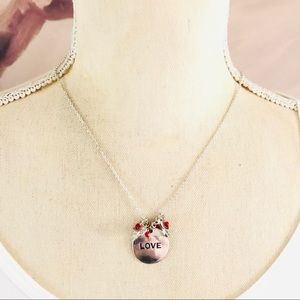 Claire’s “LOVE” disc charm beaded necklace